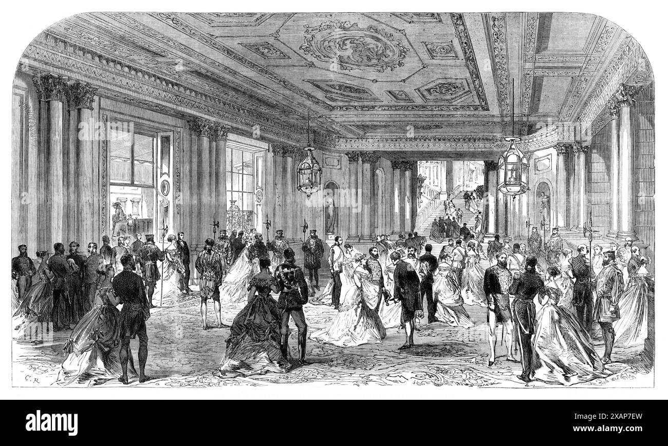 The Queen's Drawingroom: Grand Entrance-Hall, Buckingham Palace, 1868. Ospiti della Regina Vittoria. Al circolo generale parteciparono gli arcivescovi di York e Dublino, il duca di Buckingham, e i soliti ufficiali di stato. Le presentazioni alla regina superarono i 300 in numero. Al Drawingroom parteciparono anche 650 donne di distinzione. Da "Illustrated London News", 1868. Foto Stock