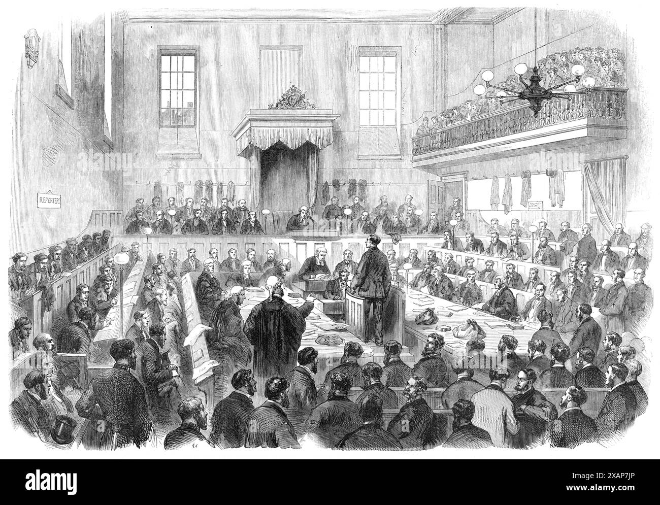 Processo della petizione elettorale di Bradford al tribunale del Borough, 1869. Veduta della... corte d'inchiesta tenuta dal signor Barone Martin per processare le presunte malpratiche alla tarda elezione di due membri per il distretto di Bradford... il giudice, in abito nero e parrucca, sedeva sulla panchina; il signor Avery, impiegato della Corte penale centrale, sedeva sotto di lui al posto dell'impiegato; il consigliere sedeva al tavolo, con gli avvocati dietro di loro; il testimone era nella tribuna dei testimoni; e le tribune, così come le gallerie, erano piene di un attento pubblico generale. Su ogni mano del giudice c'erano i Foto Stock