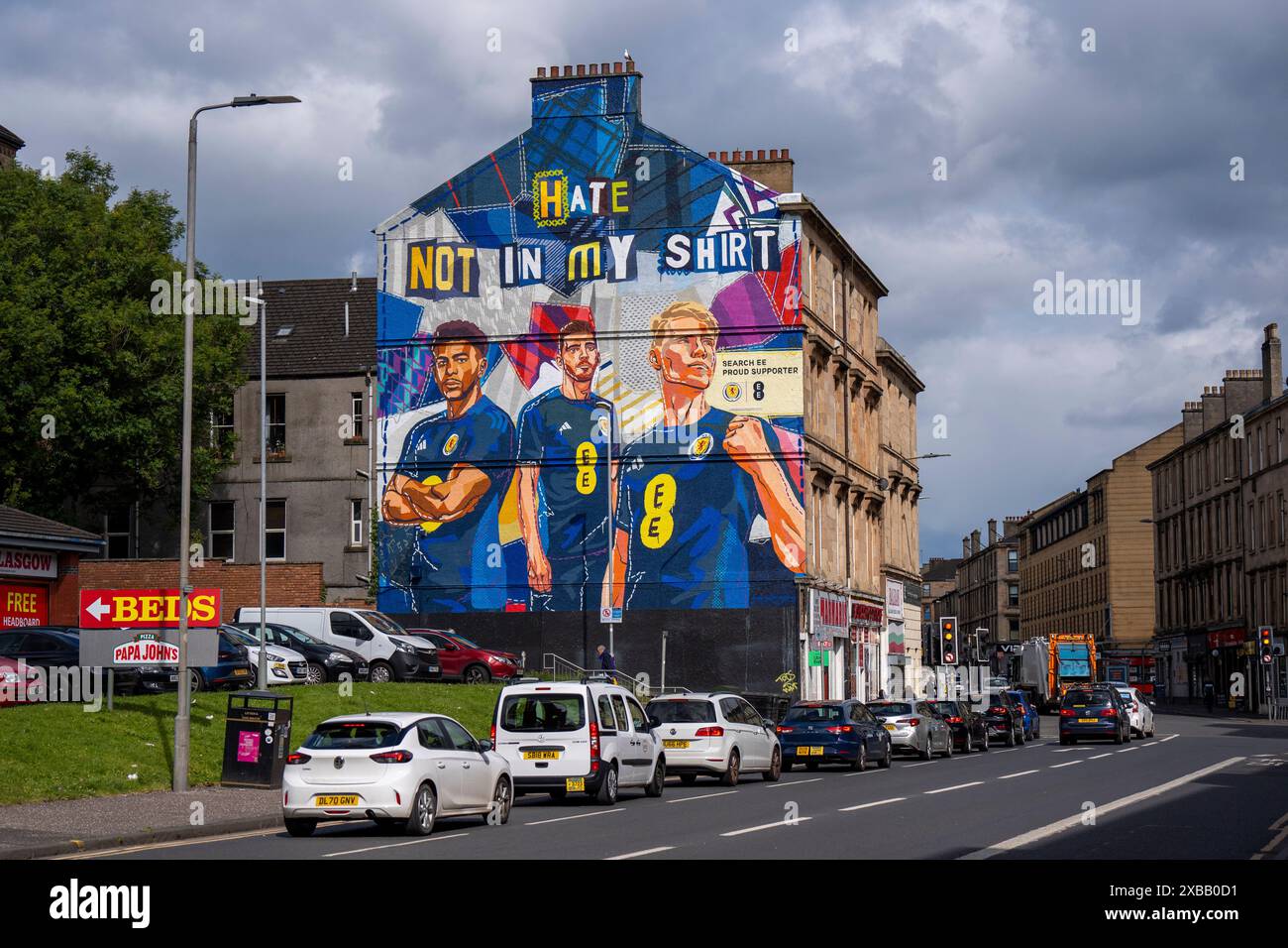 Un nuovo murale nell'estremità est di Glasgow con i giocatori scozzesi (da sinistra) che Adams, Andy Robertson e Scott McTominay, è stato svelato in vista della partita di apertura degli Euros contro la Germania di venerdì. Data foto: Martedì 11 giugno 2024. Foto Stock