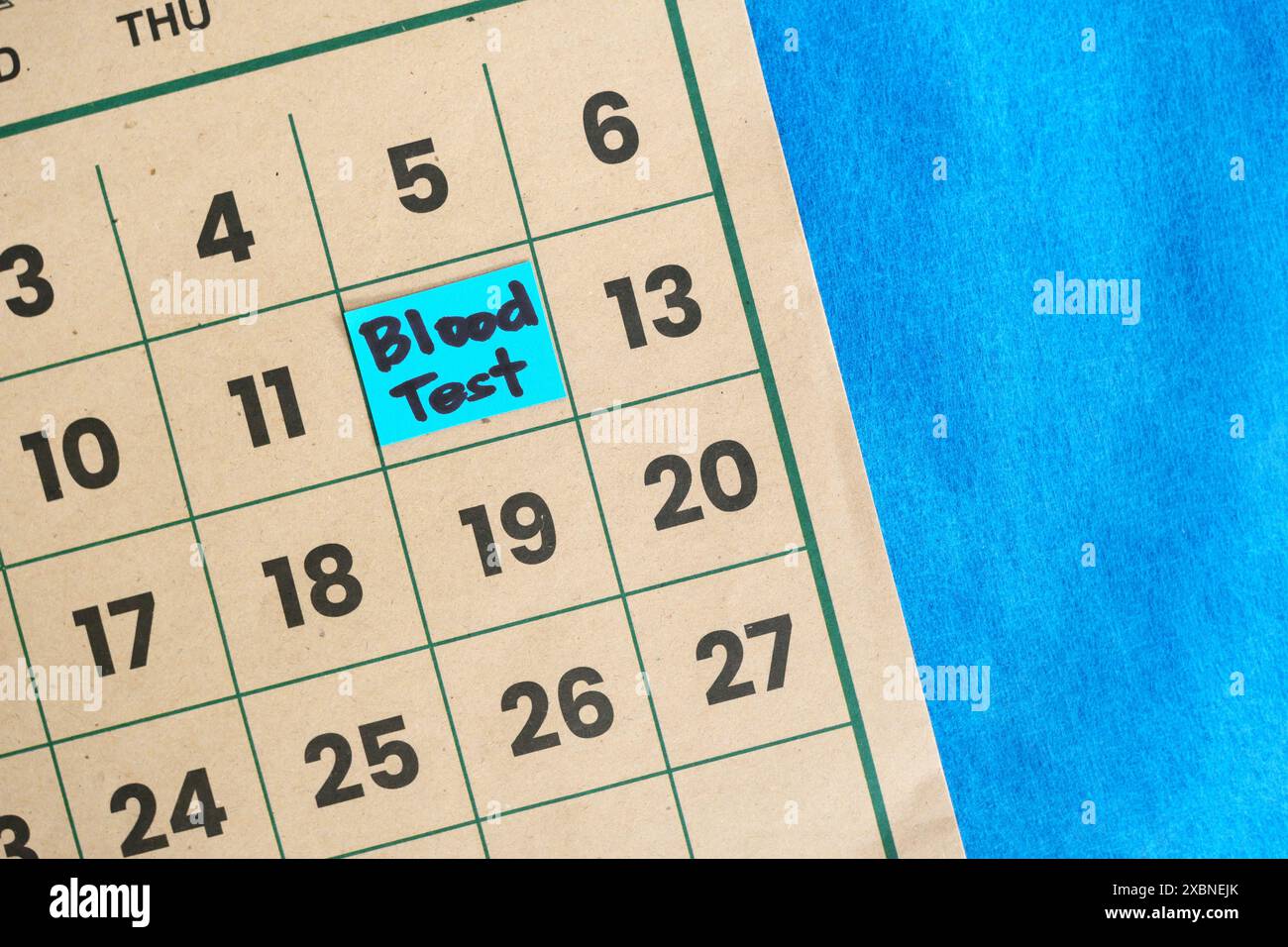 Blood test schedule concept. Written reminder note on calendar. Foto Stock