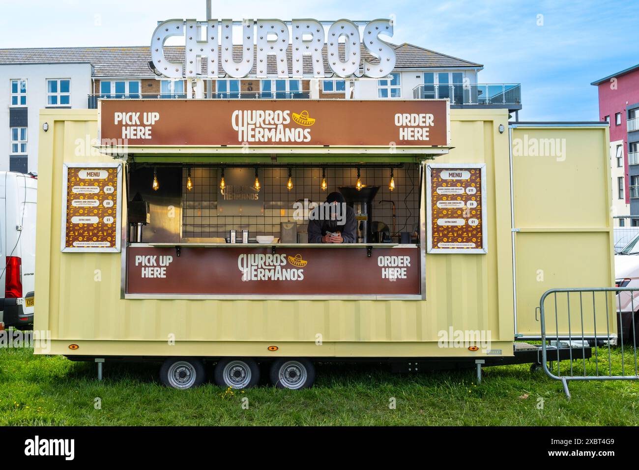 Lo Street food churros Hermanos si svolge al festival Cornwall Street Food di Newquay, in Cornovaglia, nel Regno Unito. Foto Stock