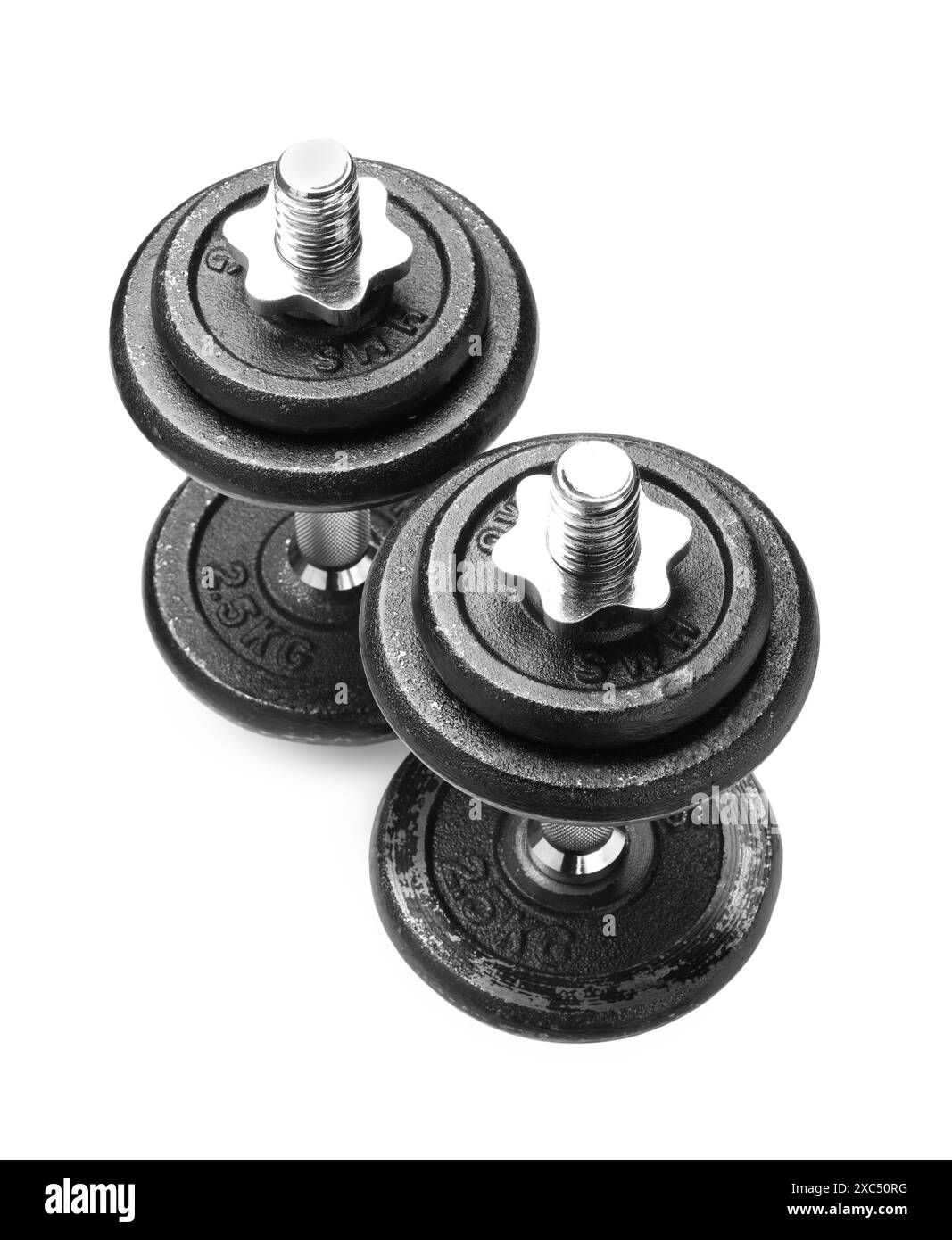 Manubri in metallo isolati su bianco. Attrezzature sportive Foto Stock