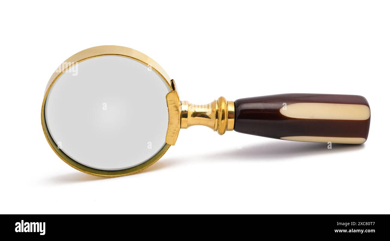 Vintage lente di ingrandimento isolati su sfondo bianco Foto Stock