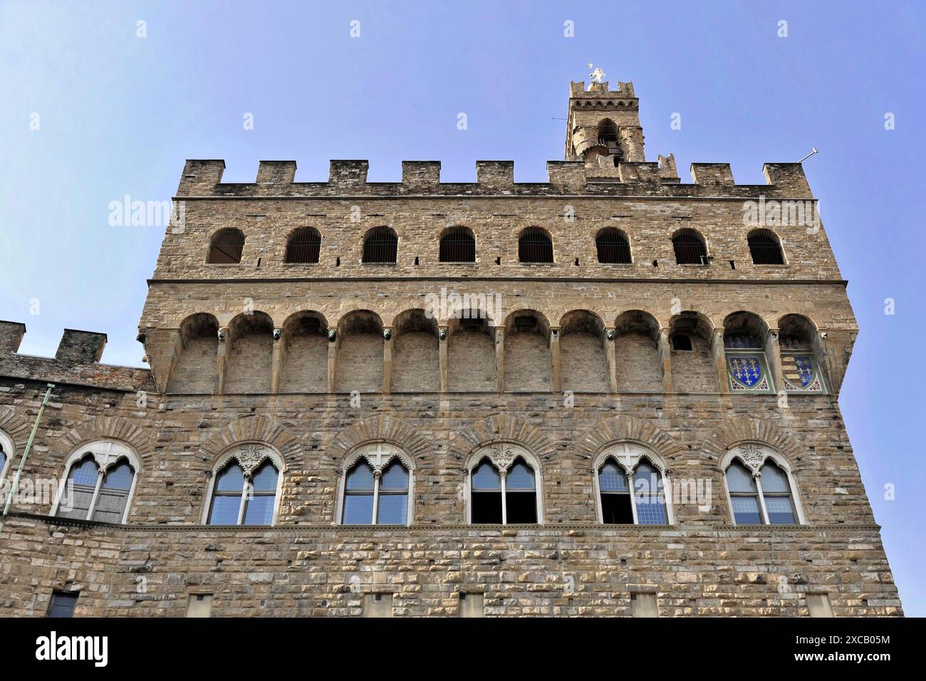 Facciata e torre della Signoria, Palazzo Vecchio, sito patrimonio dell'umanità dell'UNESCO, Firenze, Toscana, Italia, Europa, facciata di un castello medievale con Foto Stock