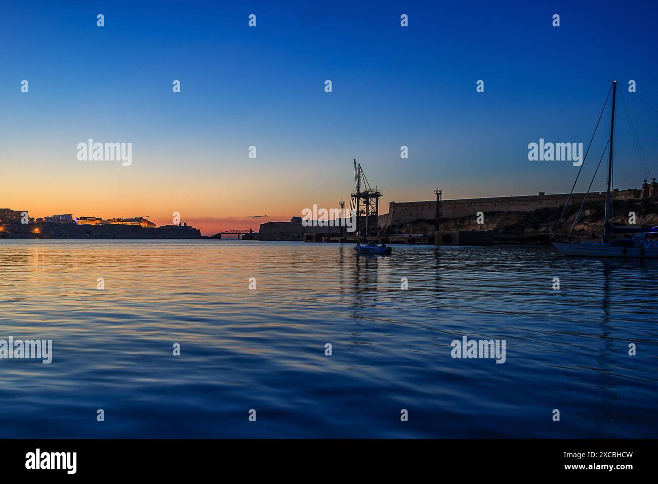 Tramonto sul Porto grande Foto Stock