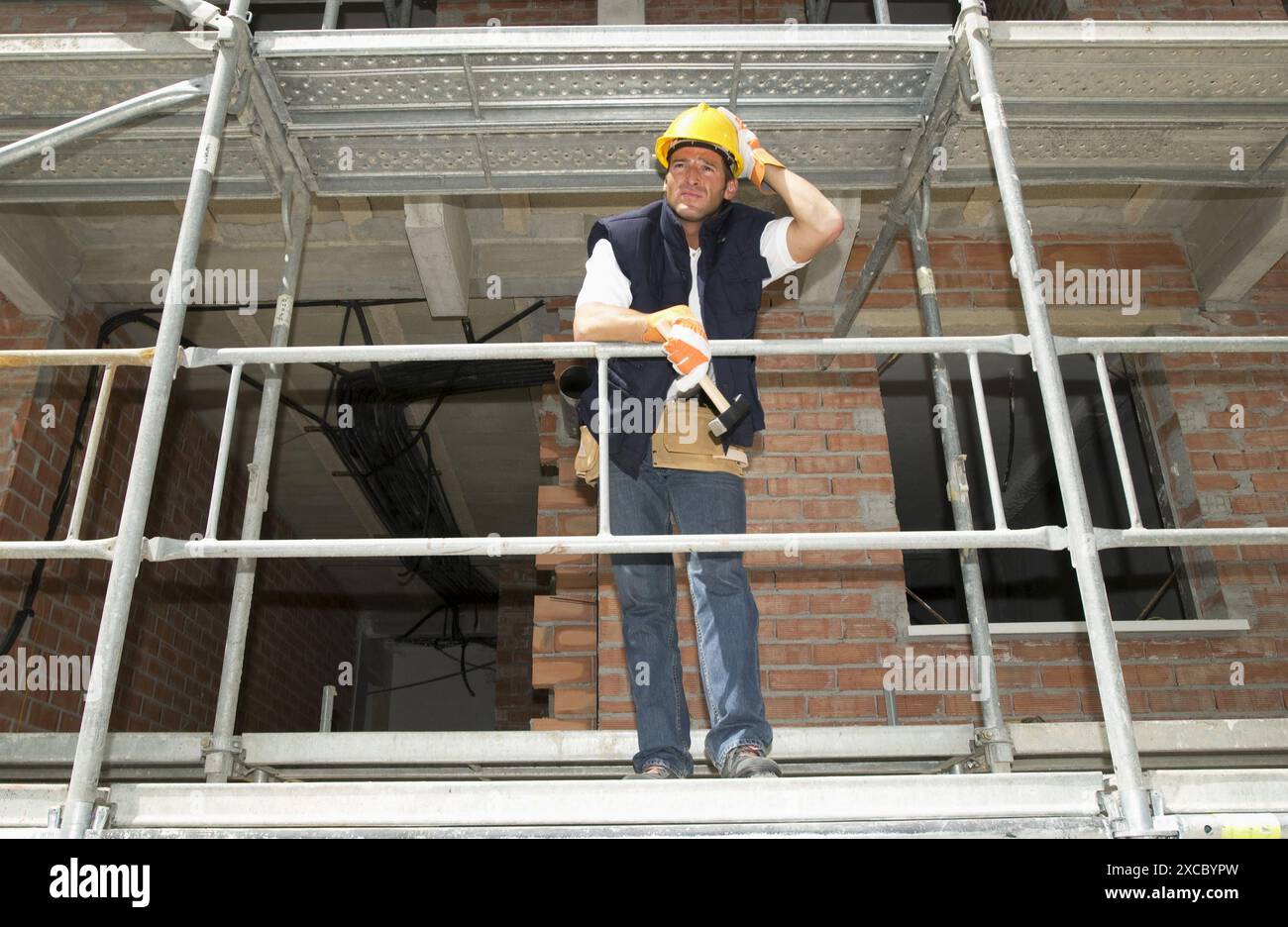 Lavoratore equipaggiamento protettivo personale, Edificio Home Foto Stock