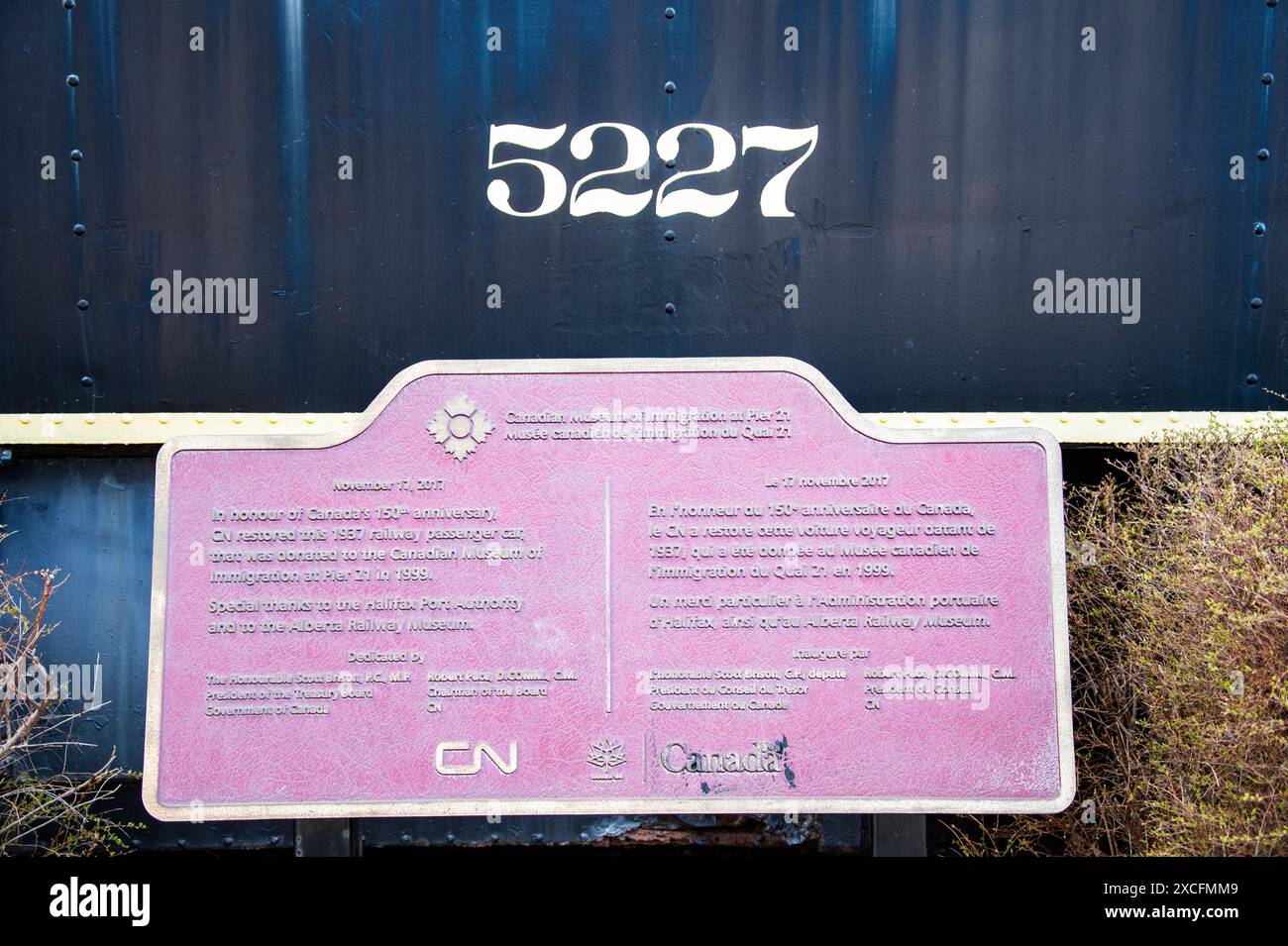 Carrozza ferroviaria CN restaurata con targa al Molo 21 nel distretto portuale di Halifax, nuova Scozia, Canada Foto Stock
