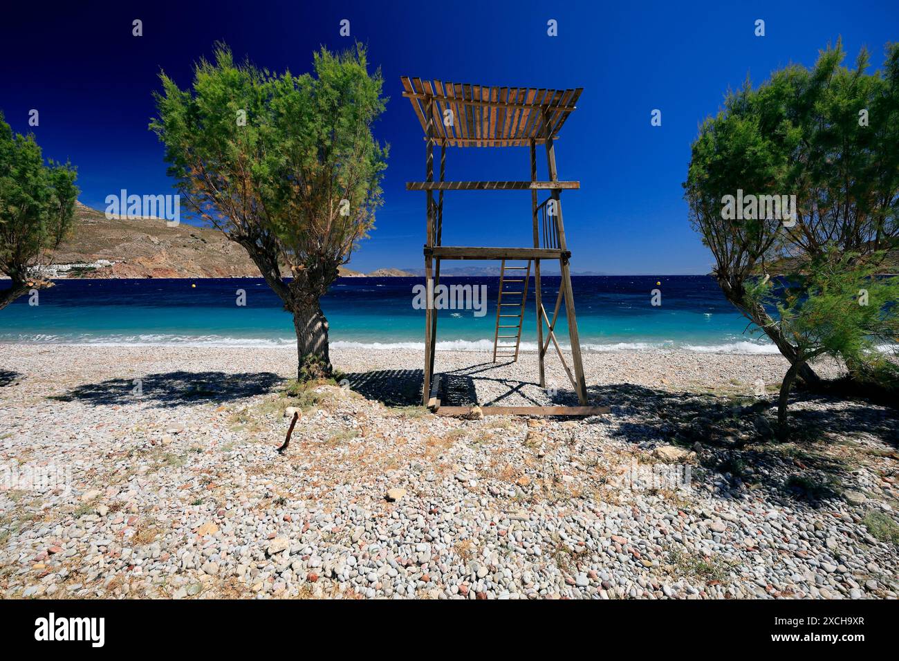 Punto di osservazione bagnino, baia di Livadia, Tilos, isole del Dodecaneso, Egeo meridionale, Grecia. Foto Stock
