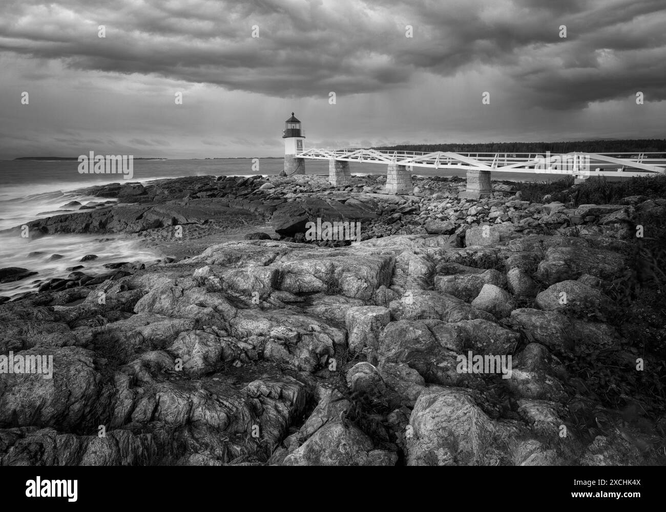 Faro di Marshall Point e rocce colorate. Maine Foto Stock