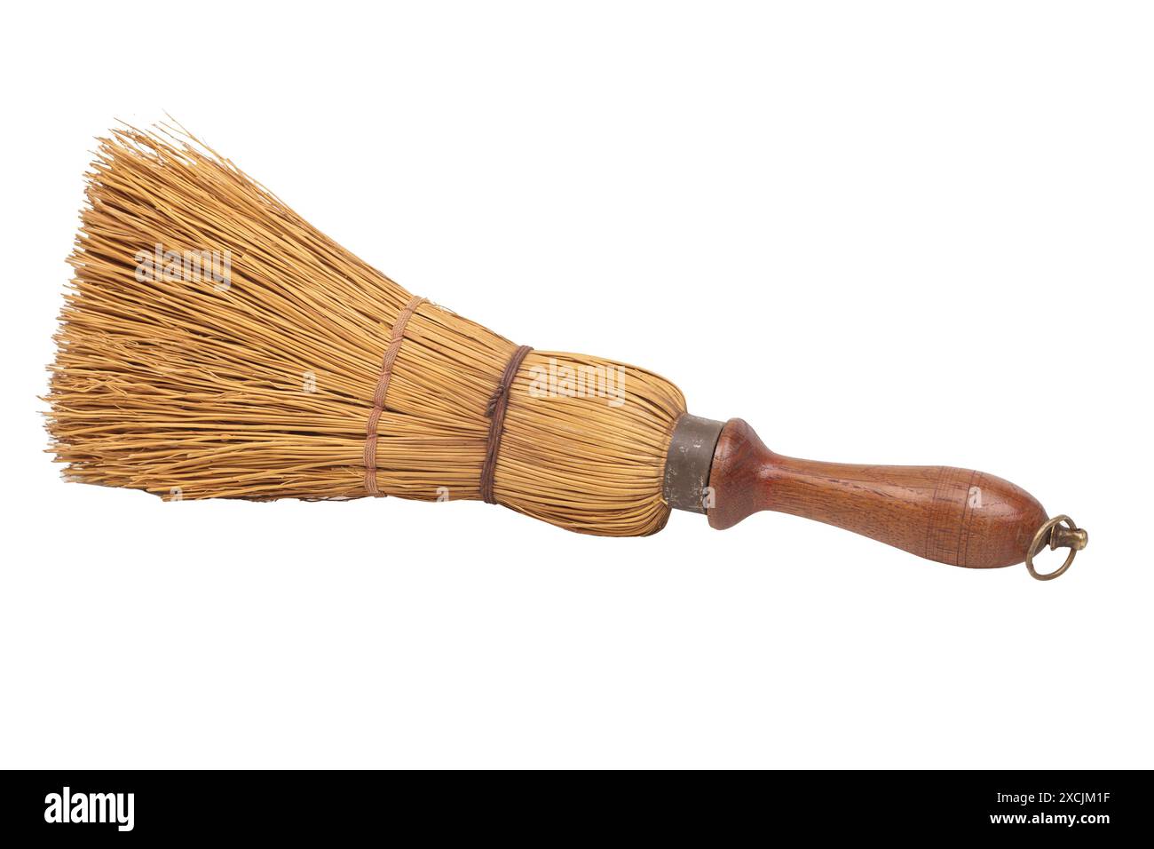 Spazzatrice manuale in paglia con manico in legno Foto Stock