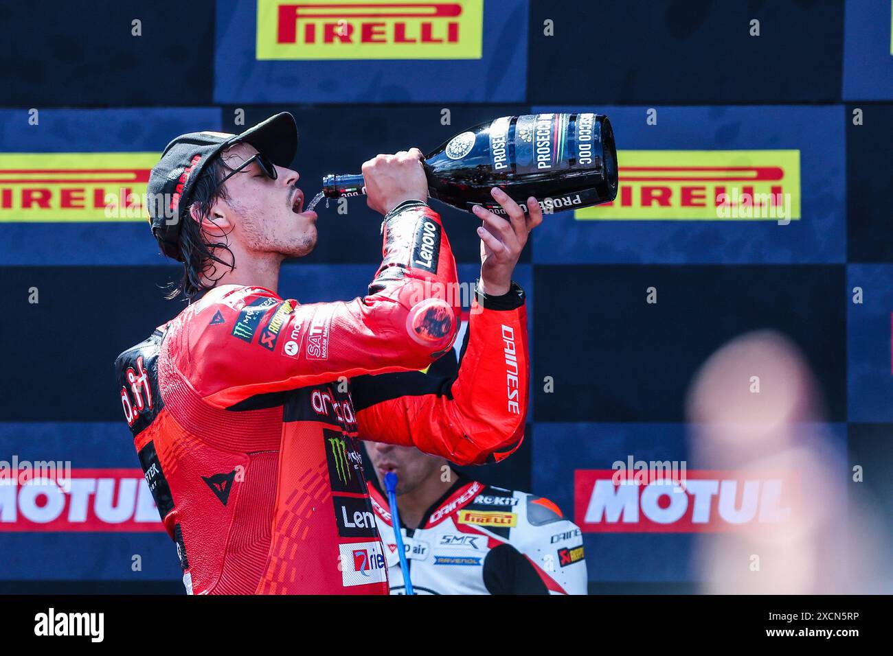 Misano Adriatico, Italia. 16 giugno 2024. Nicolo Bulega di Aruba. IT Racing - Ducati con Ducati Panigale V4R festeggia durante il Campionato del mondo FIM SBK Superbike round Pirelli Emilia-Romagna - Podio gara 2 sul Misano World Circuit. Credito: SOPA Images Limited/Alamy Live News Foto Stock