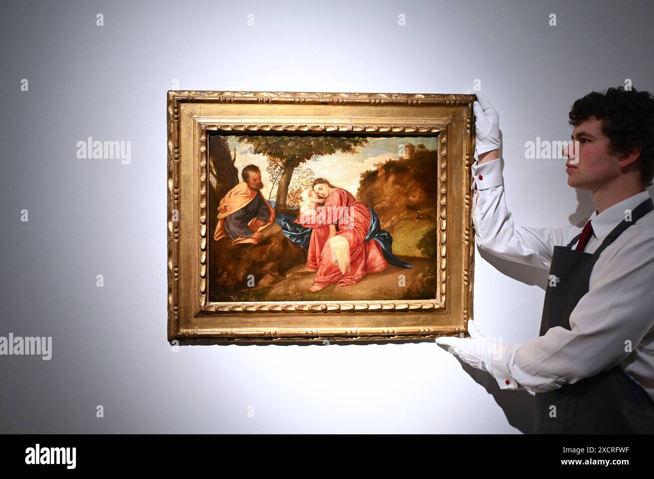 Il primo capolavoro di Tiziano riposa sul volo in Egitto essendo stata di proprietà di duchi, arciduchi e imperatori del Sacro Romano Impero, fu saccheggiata da Napoleone e rubata alla fine del XX secolo offerto da Lord Bath e dai fiduciari Longleat nell’ambito della loro strategia di investimento a lungo termine, il 2 luglio 2024 condurrà la vendita di Christie’s Old Masters Part i a Londra Foto Stock