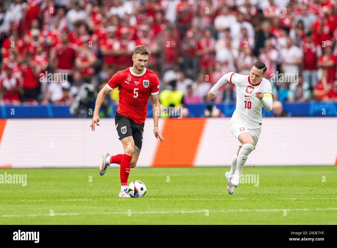 Berlino, Germania. 21 giugno 2024. Stefan Posch (5) dell'Austria visto durante la partita di UEFA Euro 2024 nel gruppo D tra Polonia e Croazia all'Olympiastadion di Berlino. Credito: Gonzales Photo/Alamy Live News Foto Stock