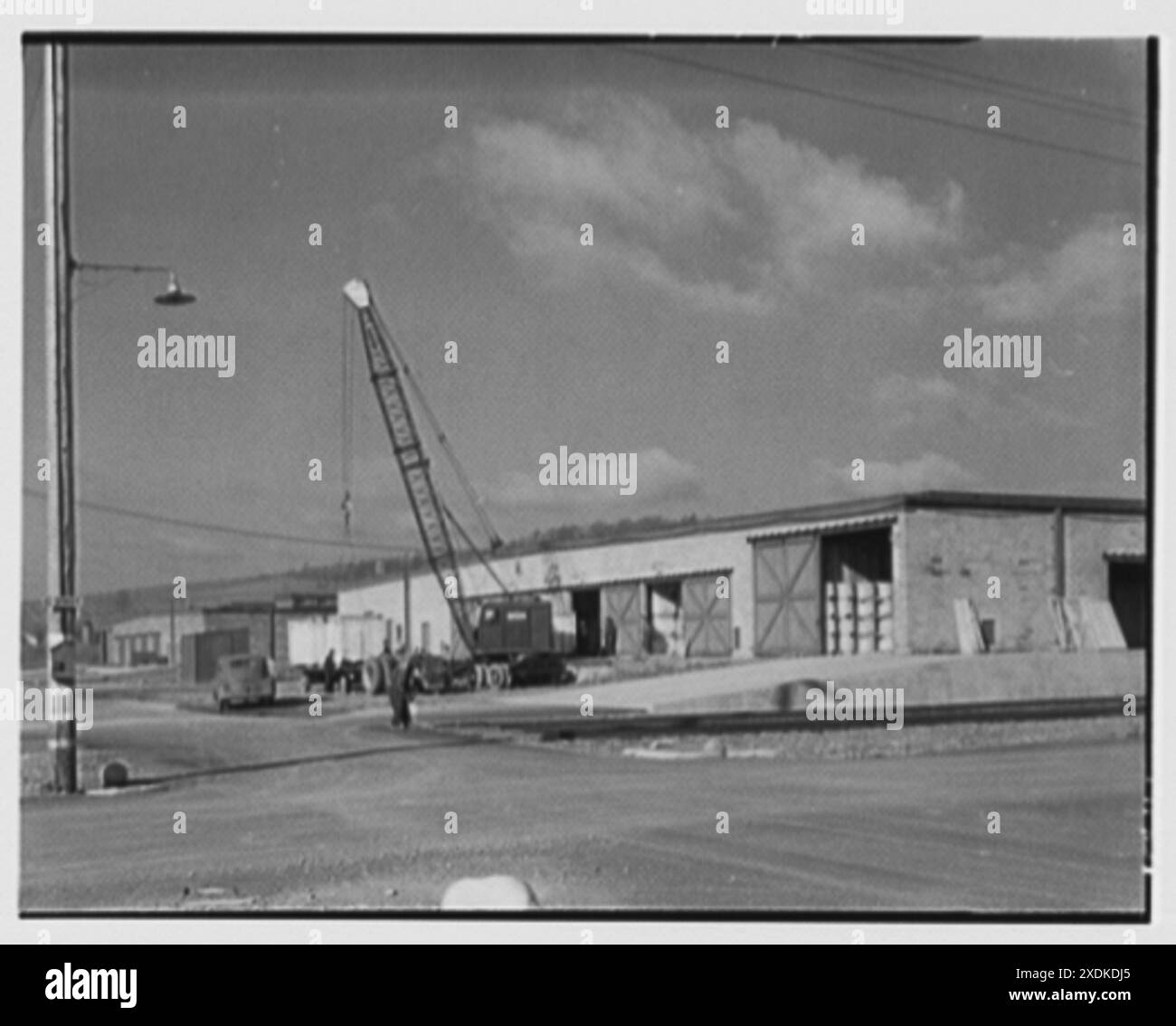 Elmira Holding e punto di rispedizione, Elmira, New York. Fine del magazzino e carico nel dumper. Collezione Gottscho-Schleisner Foto Stock