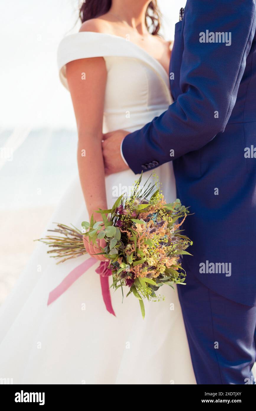 Dettaglio del bouquet di una sposa dopo il matrimonio Foto Stock