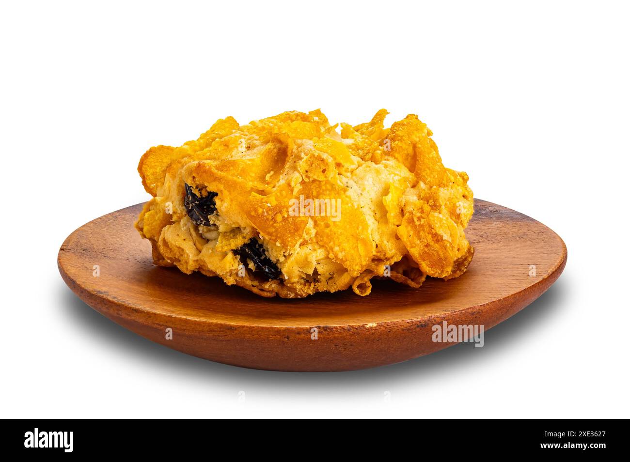 Una deliziosa cucina fatta in casa con scaglie di mais croccanti in un piatto di legno. Foto Stock