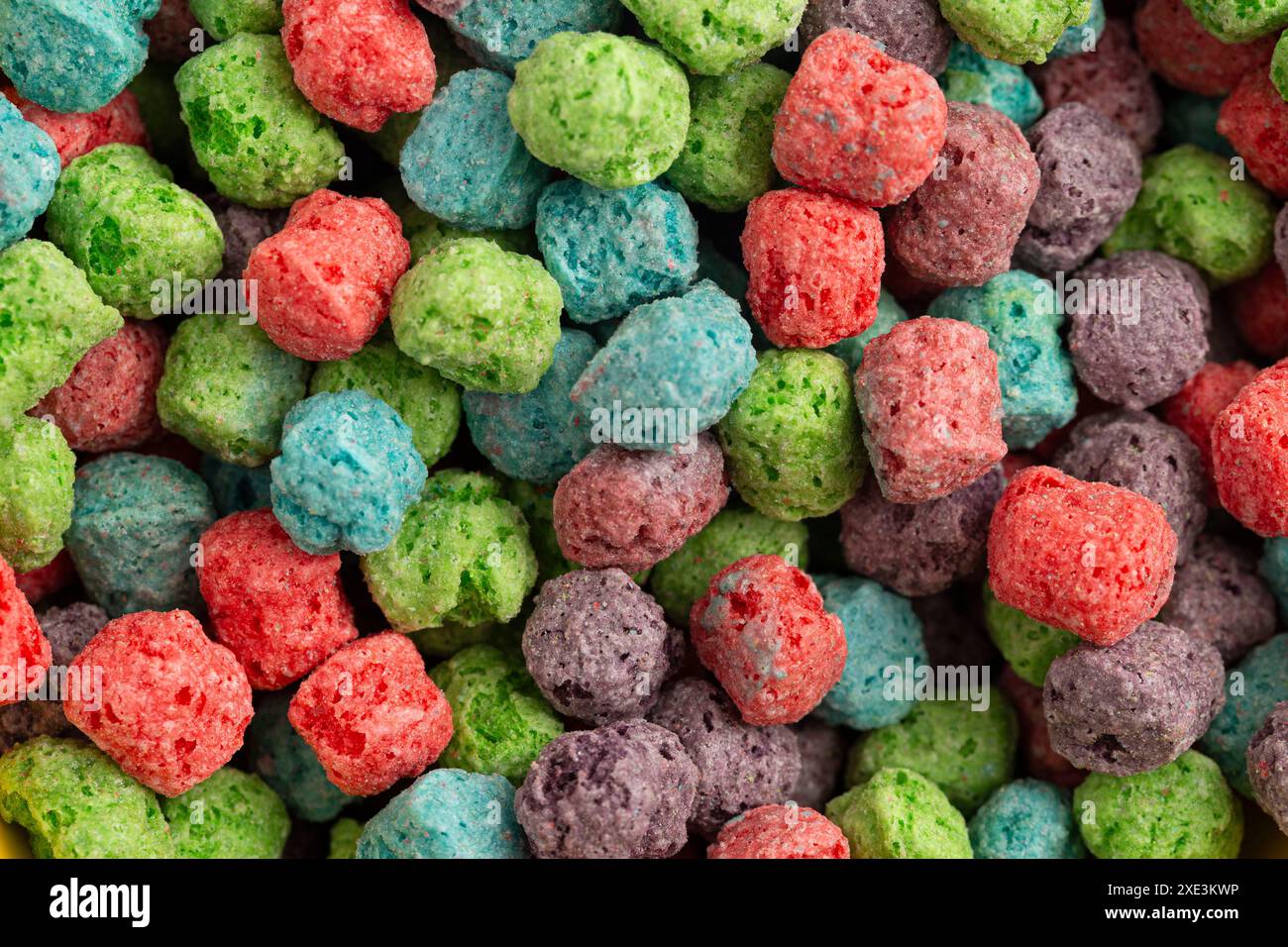 Sfondo di cereali per bambini al gusto di Red Purple Green e Blue Berry Foto Stock