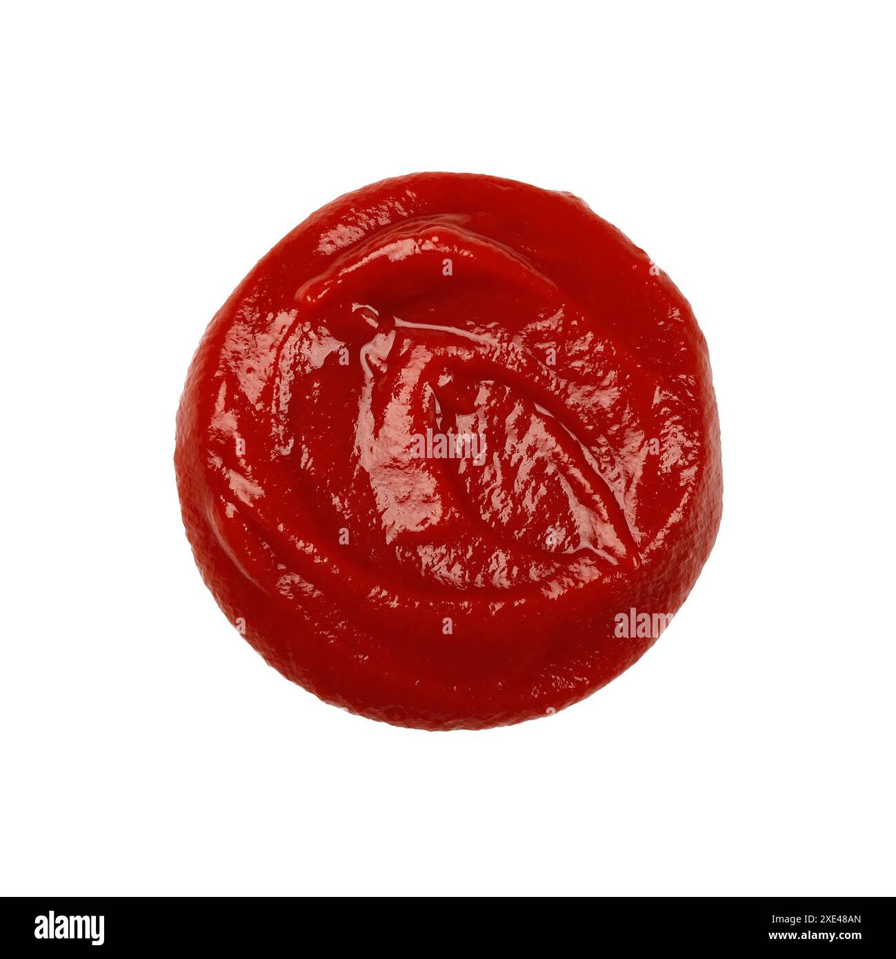 Macchie umide di ketchup di pomodoro rosso isolato Foto Stock
