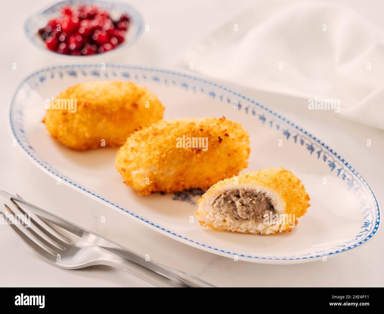 Cotoletta impanata croccante Foto Stock