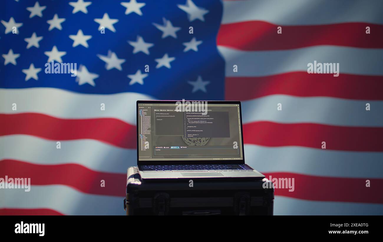 Agenzia CIA USA che utilizza strumenti di propaganda di massa su laptop per influenzare la popolazione, impegnandosi in operazioni psicologiche. L'agenzia di intelligence centrale commette il sabotaggio PsyOp usando il dispositivo, la telecamera B. Foto Stock