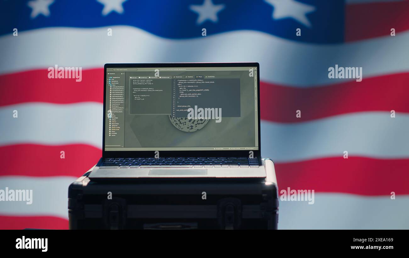 Agenzia CIA USA che utilizza strumenti di propaganda di massa su laptop per influenzare la popolazione, impegnandosi in operazioni psicologiche. L'agenzia di intelligence centrale commette il sabotaggio PsyOp usando il dispositivo, la telecamera A. Foto Stock