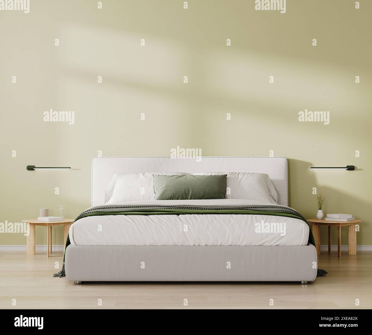 Interni moderni della camera da letto. Letto king size con biancheria da letto bianca e verde e cuscini, parete verde chiaro, rendering 3d. Foto Stock