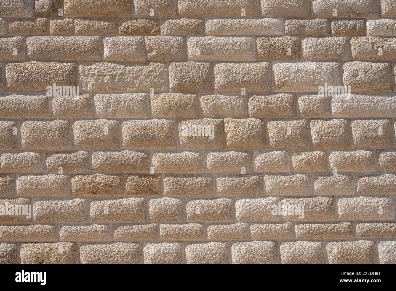 Sfondo di un vecchio muro di pietra Foto Stock
