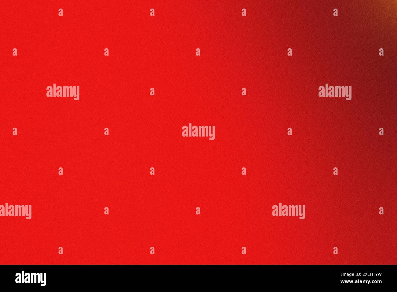 Immagine ad alta risoluzione con texture granulosa su sfondo rosso sfumato Foto Stock