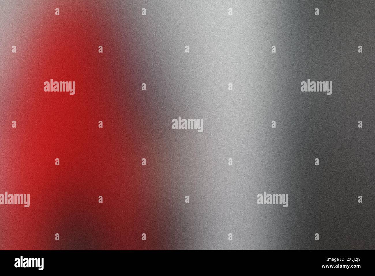 Foto grigia con un oggetto rosso sullo sfondo Foto Stock