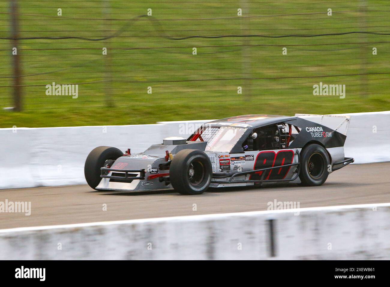 Delaware, Canada. 28 giugno 2024. La serie APC arriva a Delaware, Ontario. Driver della Modifieds Series Mark Hamacher (90) di Komoka, Ontario. Crediti: Luke Durda/Alamy Foto Stock