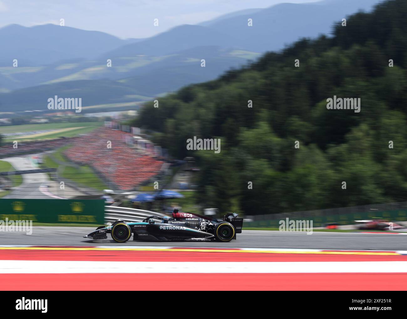 Spielberg, Austria. 30 giugno 2024. Il pilota britannico di Mercedes George Russell gareggia nel Gran Premio d'Austria di Formula 1 a Spielberg, Austria, il 30 giugno 2024. Credito: He Canling/Xinhua/Alamy Live News Foto Stock