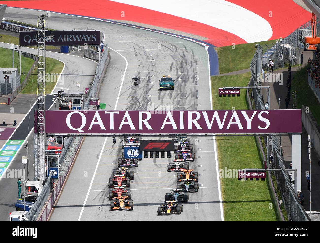 Spielberg, Austria. 30 giugno 2024. I piloti partono durante la gara del Gran Premio d'Austria di Formula 1 a Spielberg, Austria, il 30 giugno 2024. Credito: He Canling/Xinhua/Alamy Live News Foto Stock