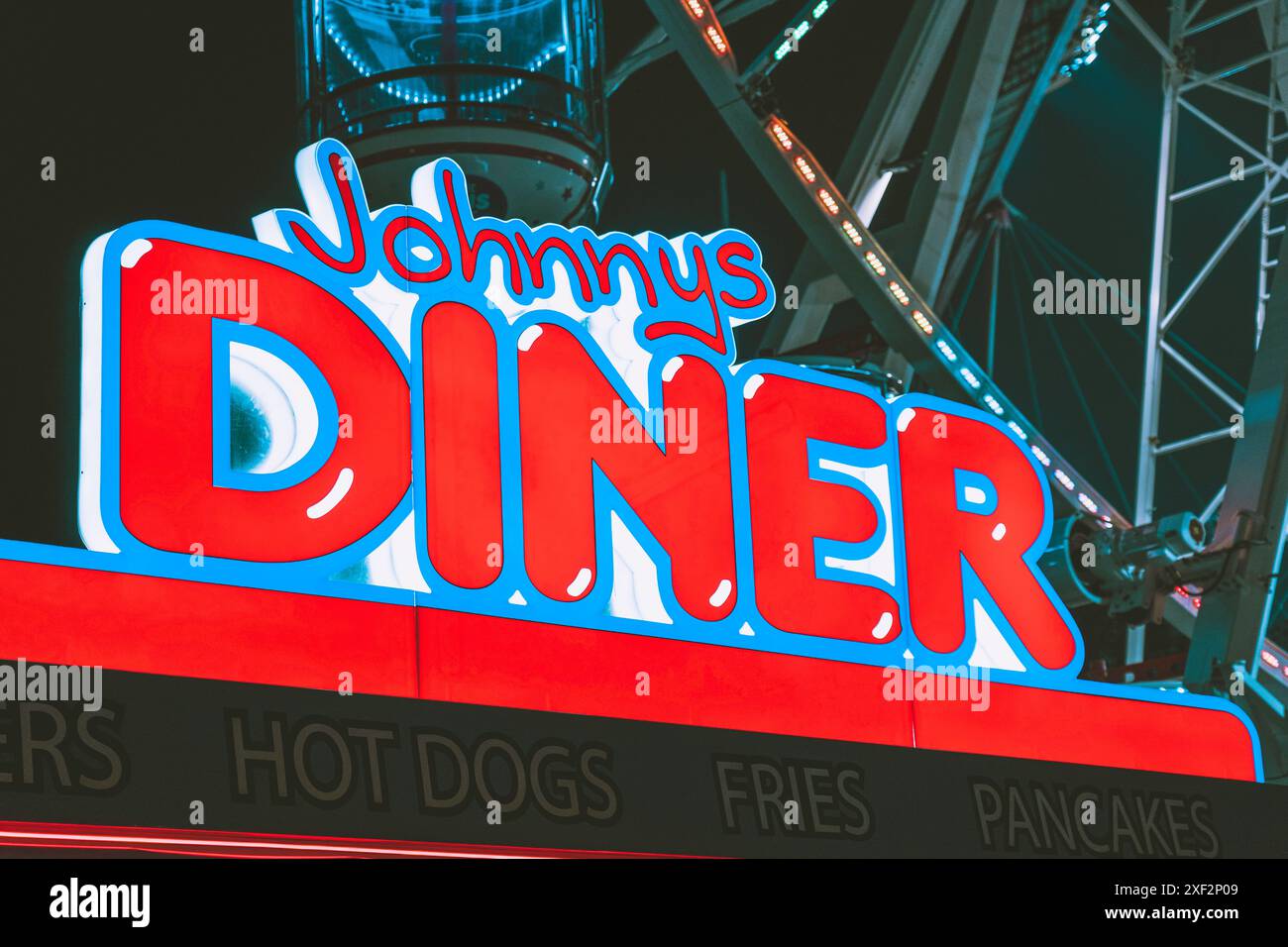 Insegna del cibo rosso blu al neon Johnnys Diner Foto Stock