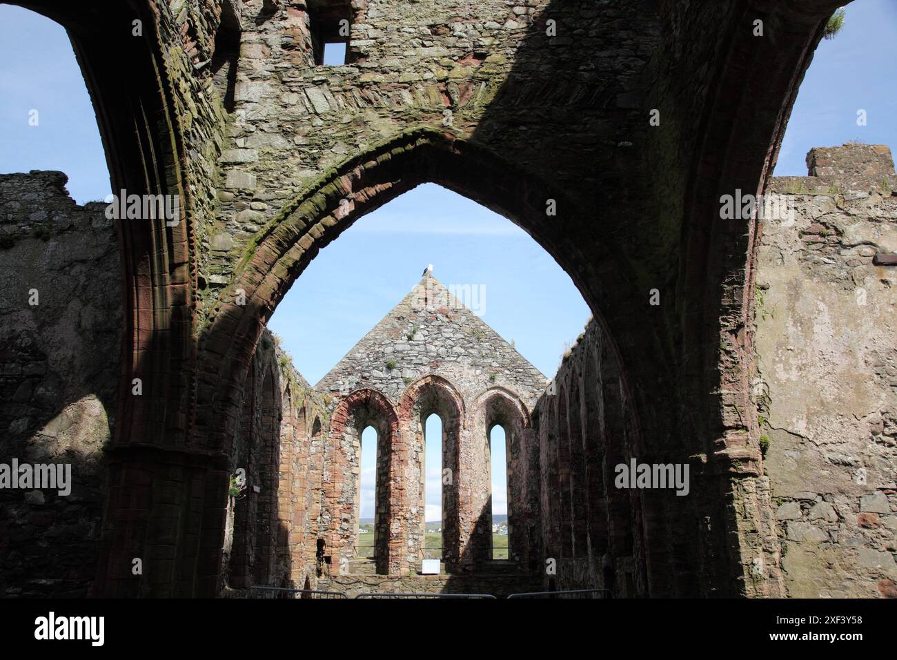 Rovine del Cancellino della Cattedrale di St Tedesco nel castello di Peel, costruito dai norvegesi nell'XI secolo, su St. Patrick's Isle a Peel sull'Isola di Man Foto Stock