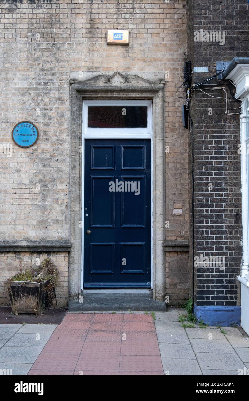 G R Crickmay Architects 1883 targa blu su una casa a Dorchester Foto Stock