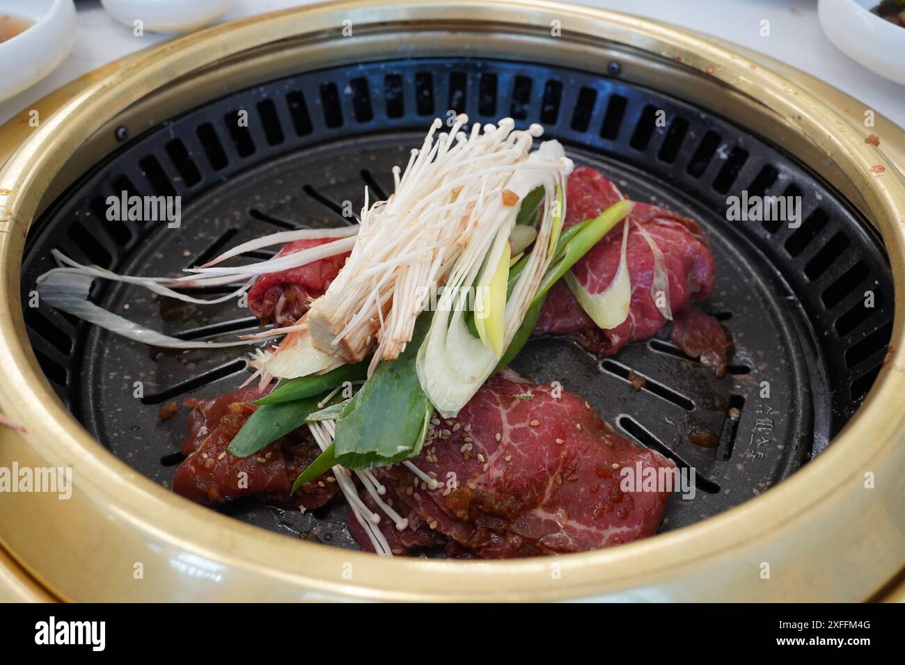 Il bulgogi è un famoso piatto di carne coreana Foto Stock