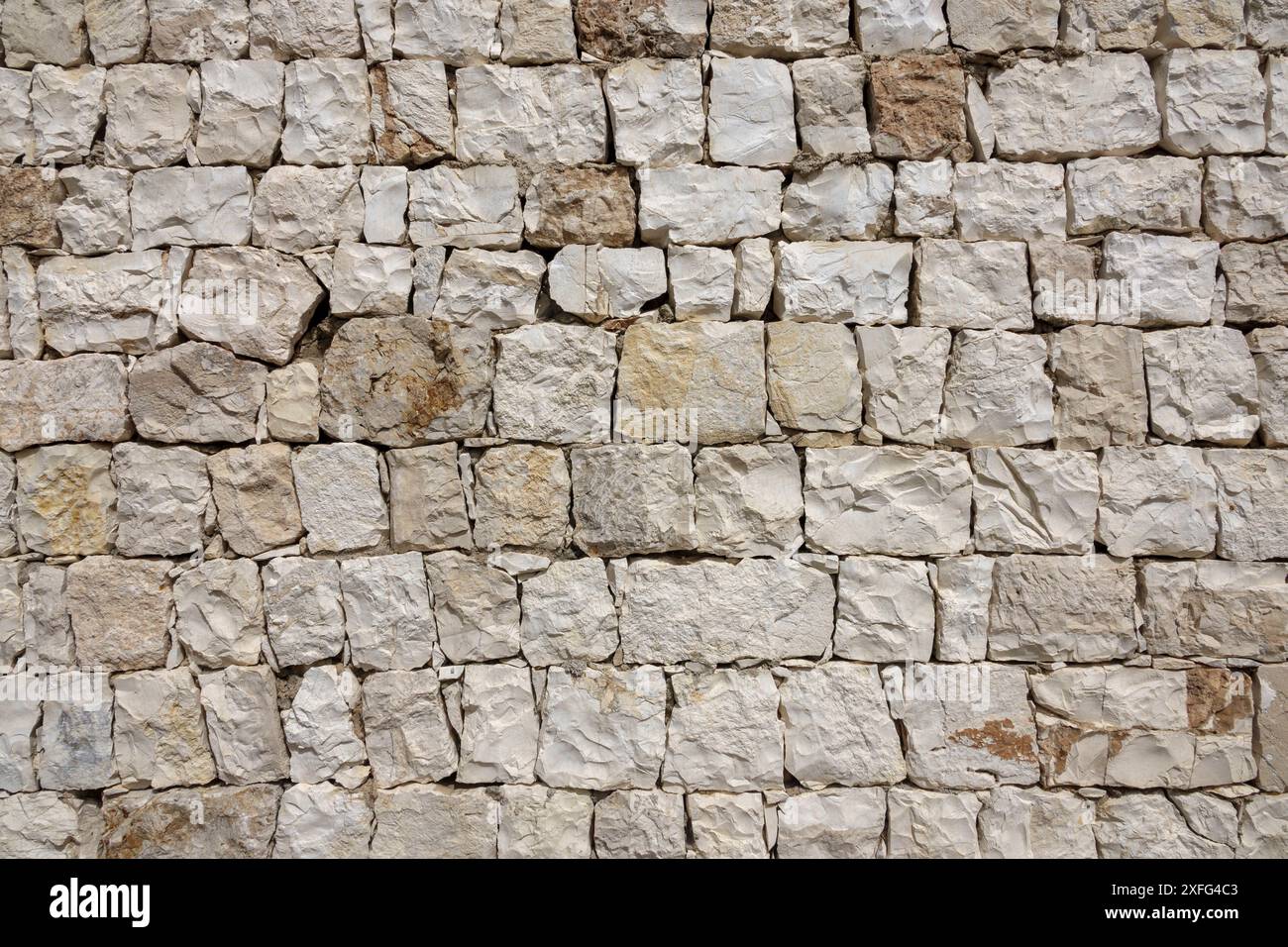 Una sezione di muratura uniforme in pietra a blocchi, Cefalonia, Grecia Foto Stock