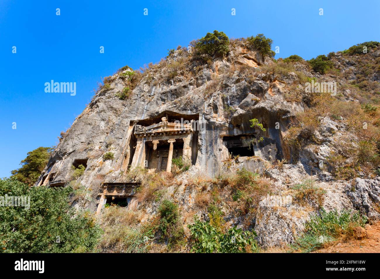 La Tomba di Amyntas o Tomba di Fethiye è un'antica tomba di roccia Licia nell'antica Telmessos, in Licia. Ora si trova nella città di Fethiye, nella provincia di Mugla, in Turchia. Foto Stock