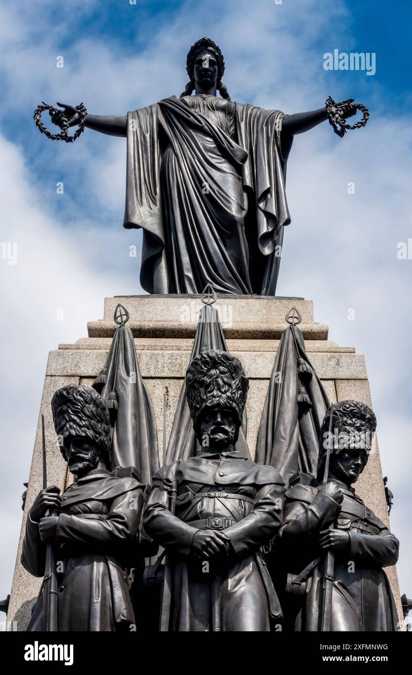 Il Guards Crimean War Memorial a Waterloo Place, Londra Foto Stock