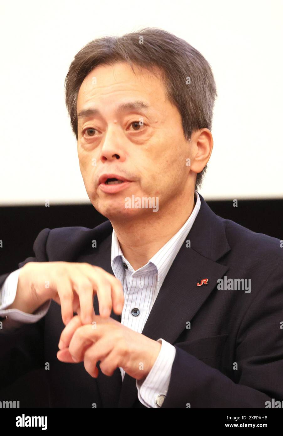 Tokyo, Giappone. 4 luglio 2024. il presidente della compagnia giapponese Kyushu Railway (JR Kyushu) Yoji Furumiya annuncia che JR Kyushu e l'impresa eVTOL SkyDrive hanno accettato di avviare uno studio di fattibilità per sviluppare eVTOL nella resione di Kyushu, nel Giappone occidentale, in una conferenza stampa congiunta a Tokyo giovedì 4 luglio 2024. SkyDrive ha iniziato a produrre l'ultima eVTOL SD-05 con Suzuki Motor e la presenterà al World Expo Osaka/Kansai il prossimo anno. (Foto di Yoshio Tsunoda/AFLO) Foto Stock