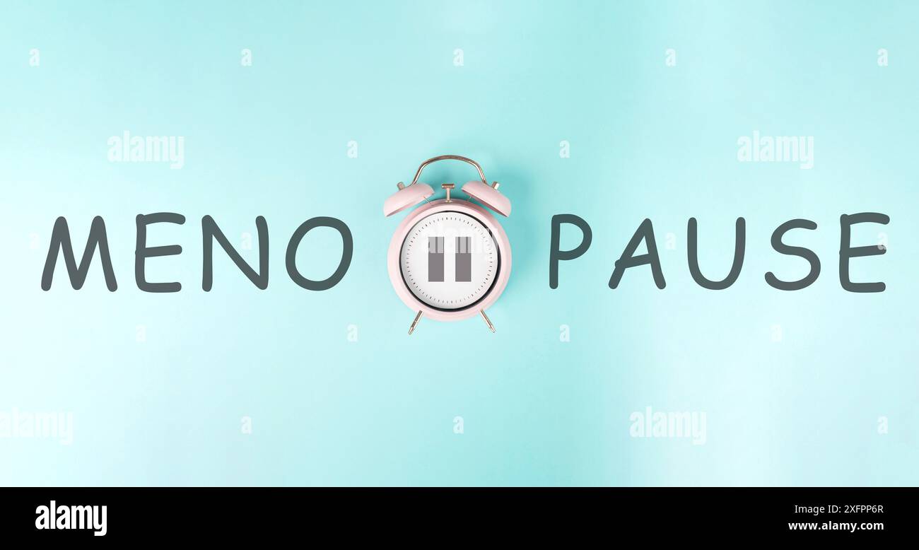 Sveglia con segno di pausa e la parola menopausa, terapia ormonale sostitutiva Foto Stock