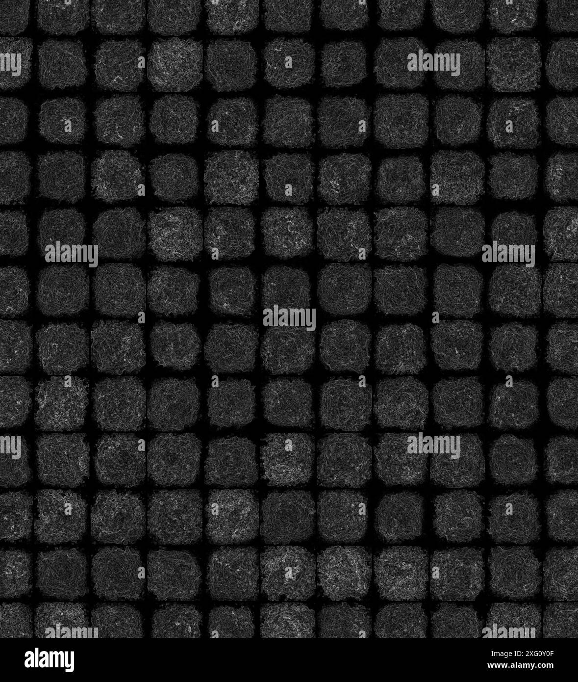Griglia astratta con quadrati neri e grigi testurizzati che creano un effetto geometrico Foto Stock