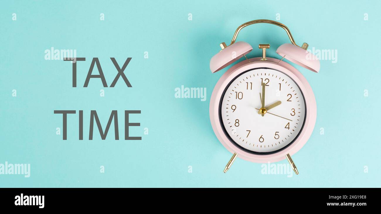 Ora fiscale, sveglia per le imposte, termine per il pagamento, reddito finanziario Foto Stock