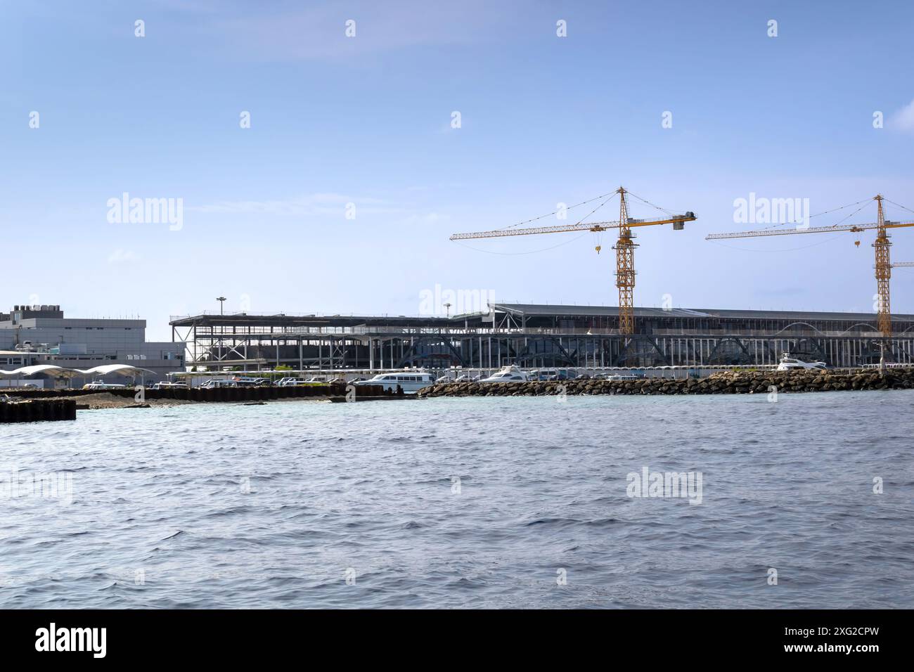 Un nuovo terminal dell'Aeroporto Internazionale di Velana in costruzione, Malé, Maldive Foto Stock
