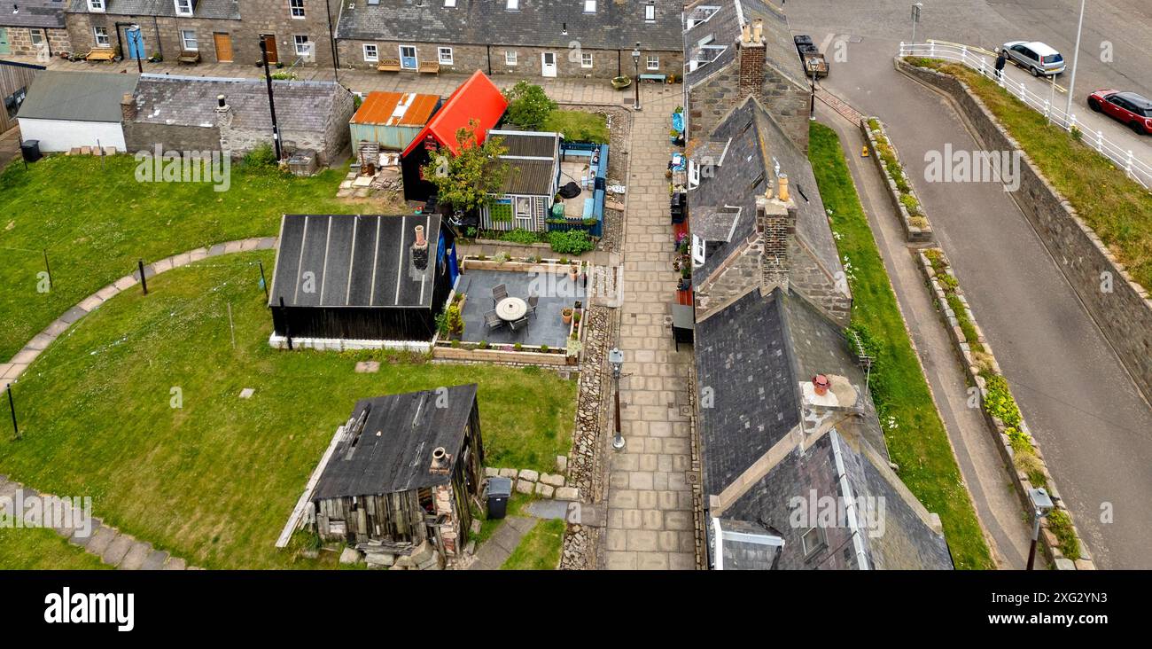 Footdee o Fittie Aberdeen, un vecchio villaggio di pescatori alla fine del porto di Aberdeen, vecchi capannoni di tarry fatti di legno di mare Foto Stock