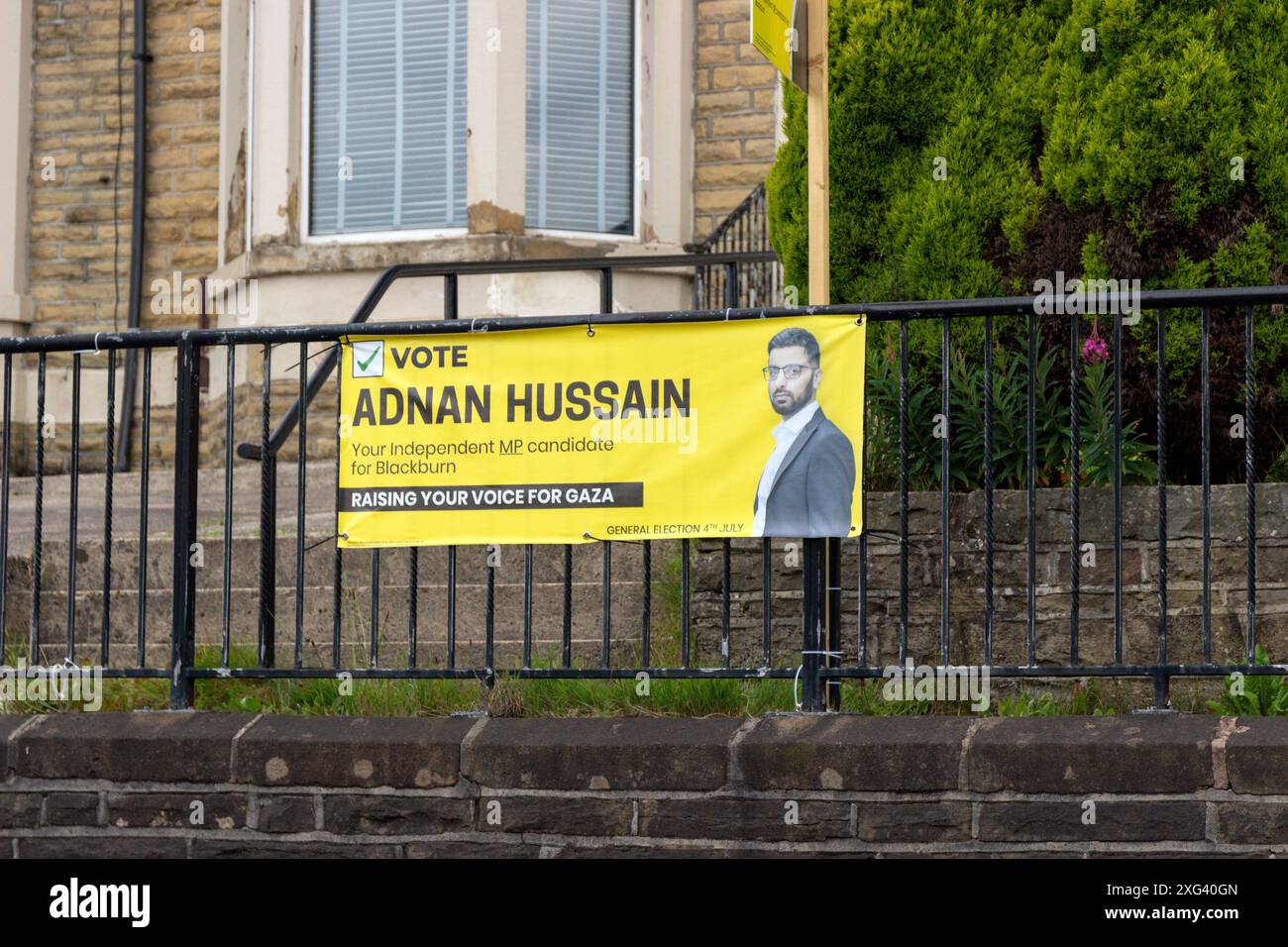 Banner per il candidato indipendente Adnan Hussain per le elezioni generali del 2024. Whalley Range, Blackburn. Foto Stock