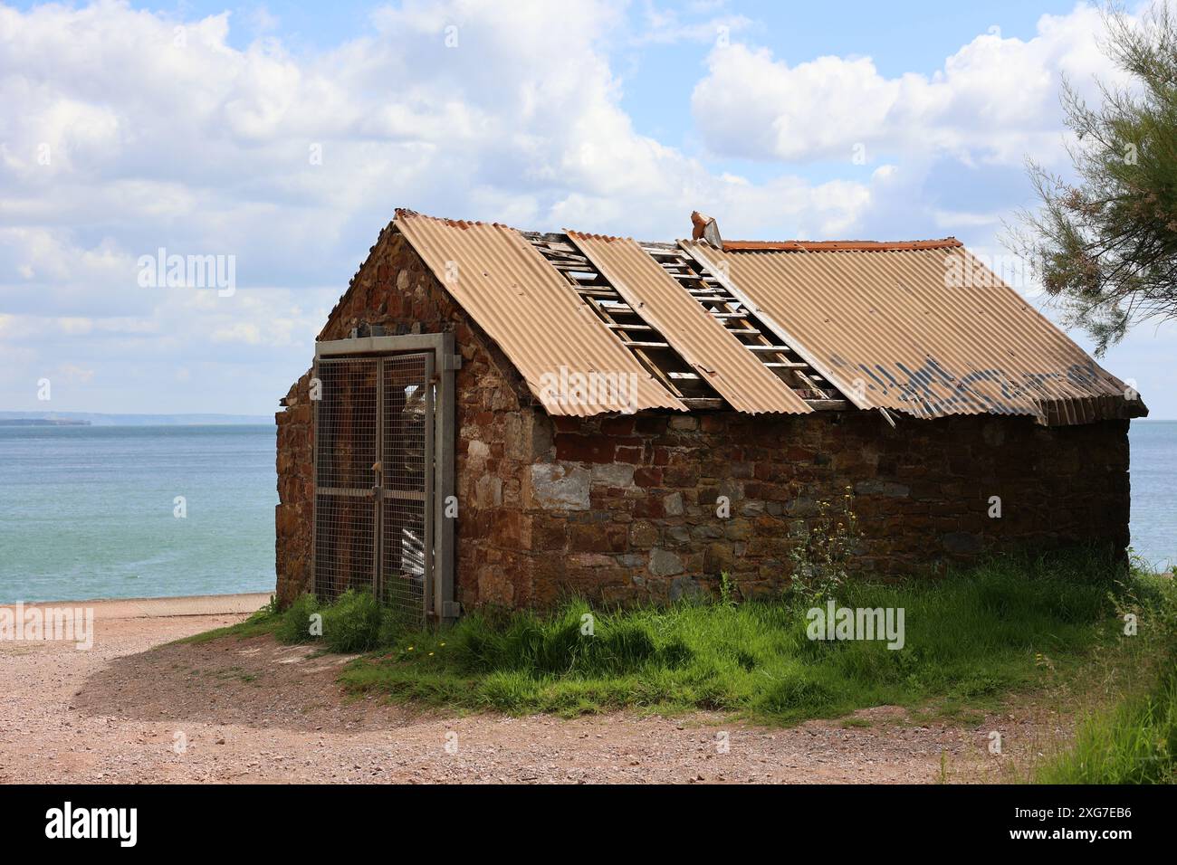 Capanna ai margini della baia di Teignmouth Foto Stock