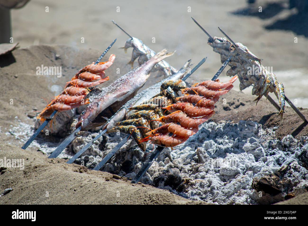 La cucina tradizionale a base di pesce (espetos) è profondamente radicata nel patrimonio ittico di Malaga Foto Stock