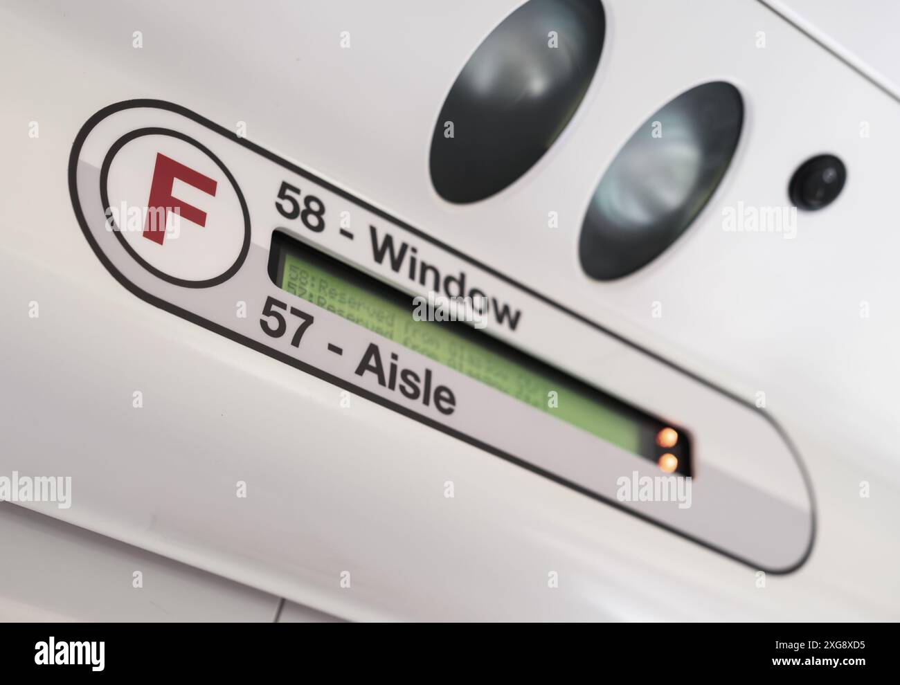 Una prenotazione digitale di posti a sedere su Un treno nel Regno Unito, con bassa profondità di fuoco Foto Stock