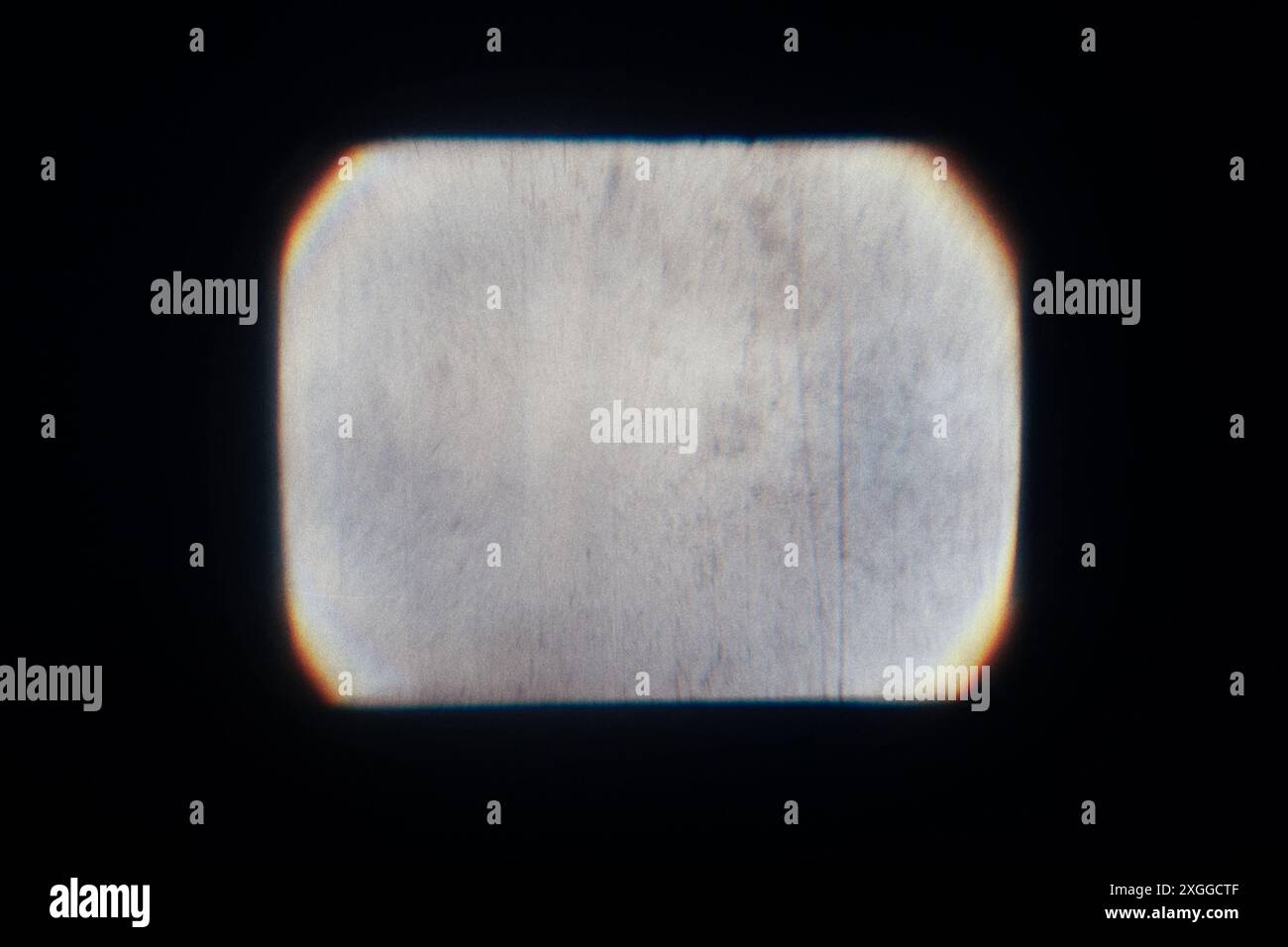 Il rettangolo di luce su uno sfondo nero proveniente dal proiettore per lucidi Foto Stock